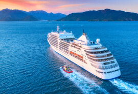 Ship sailing into the sunset